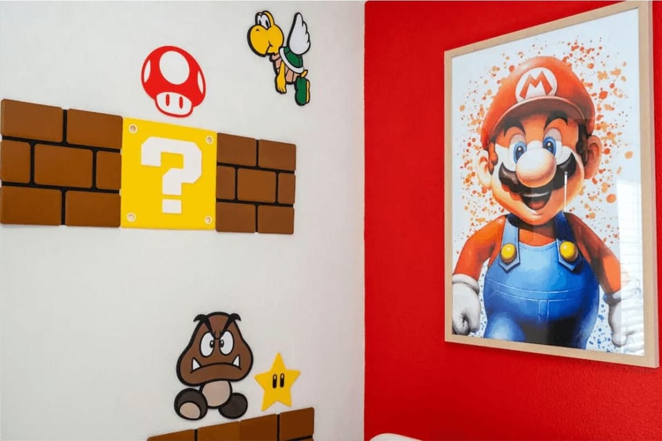 Bedroom 4: Two single beds, Smart TV. Kids' room adorned with delightful Mario Bross decor 