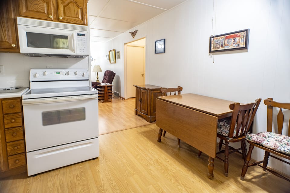 Kitchen stove, oven, microwave, and table