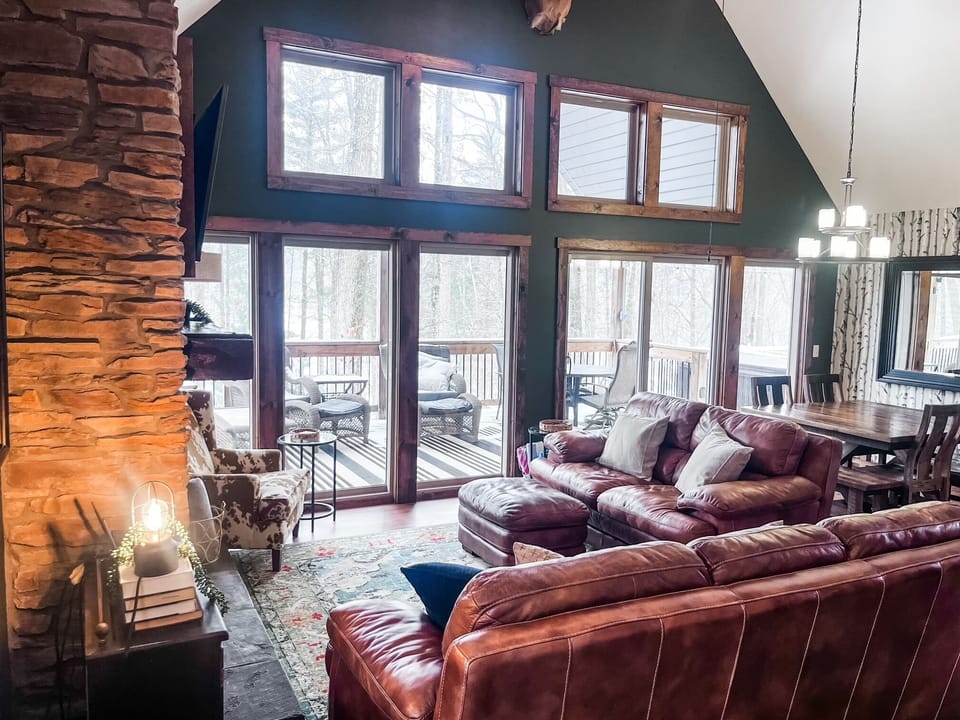 Pine Lane offers the perfect cozy living space, inside and out. Enjoy the gas fireplace and floor to ceiling windows.