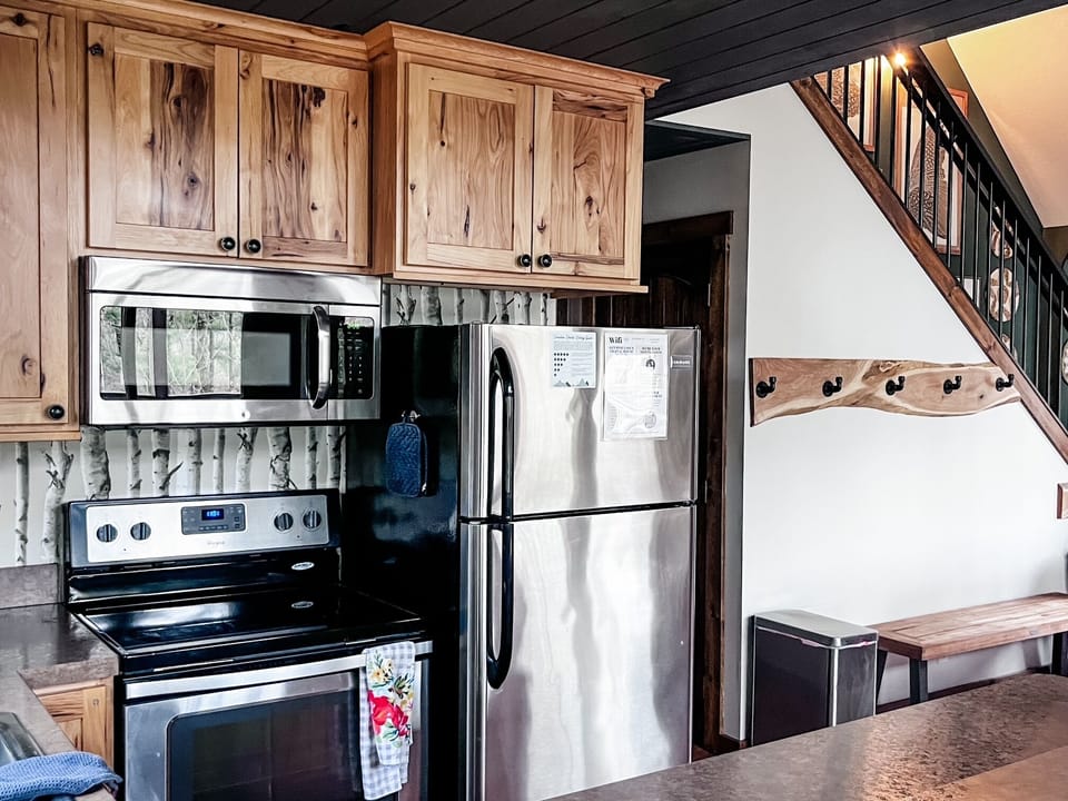 Pine Lane kitchen supplies plenty of everything you need for your stay.  Cookware, bakeware, crockpot, blender, toaster, drip and Keurig coffee makers, as well as more than enough flat ware and dishes! 