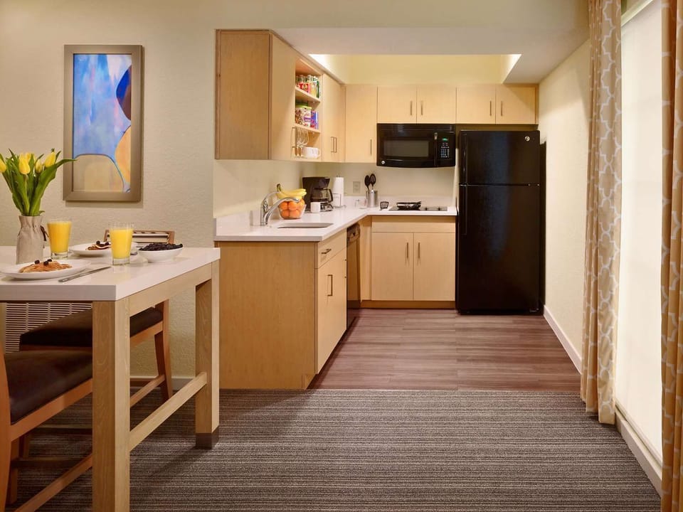 Start slow mornings with an easy kitchenette and breakfast nook.