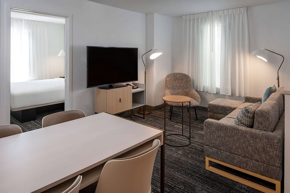 Relax together in the spacious lounge with big-screen TV.