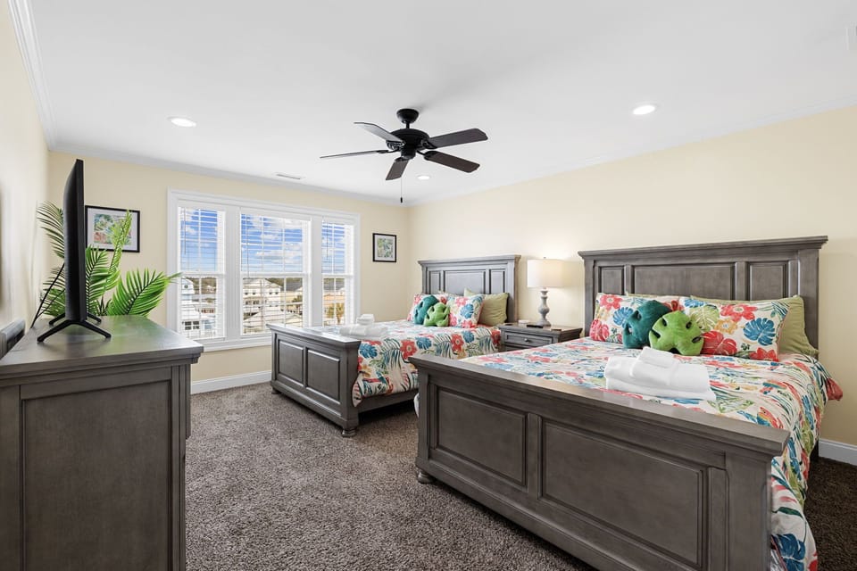 Send the kids up to the top-floor two-queen room where they get their own floor and you get your peace.