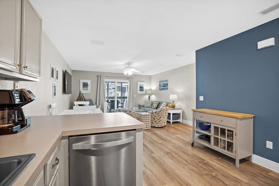 Cook together in the open plan where the kitchen flows right into the dining table and living area.