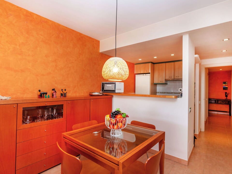 Table, Furniture, Property, Cabinetry, Countertop, Wood, Orange, Interior Design, Chair, Kitchen