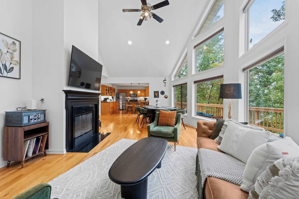 Wood burning Fireplace and huge TV!