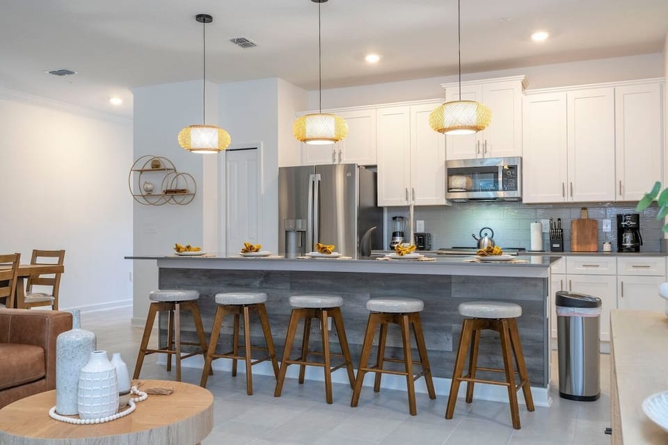  This kitchen is perfect for families and groups of friends looking to enjoy a relaxing vacation in a home away from home.
