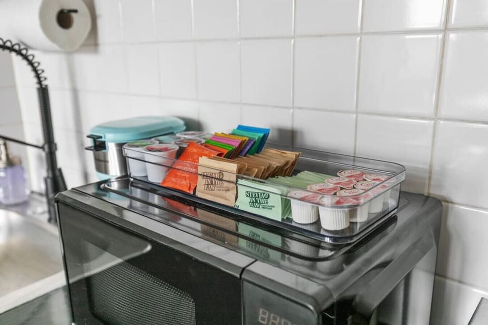 Coffee bar includes all the essentials for your morning brew including a Keurig and a starter set of K-cups, tea, creamer, sugar and stevia. Enjoy!