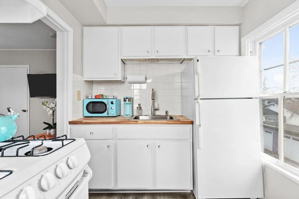 All the necessities for your morning brew are provided including a Keurig and a starter pack of k-cups, tea, creamer, sugar and stevia.