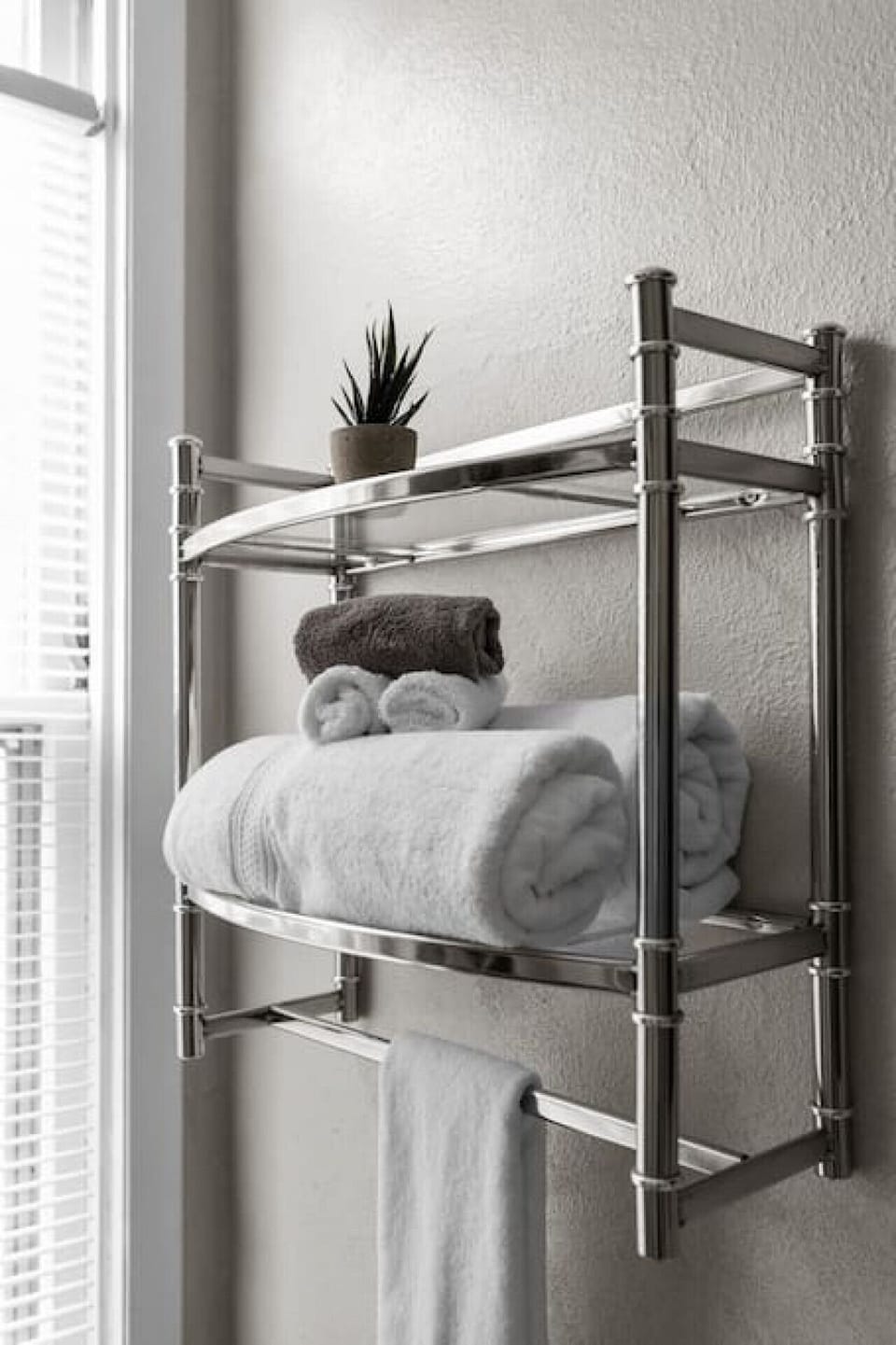 The bathroom is stocked with towels.