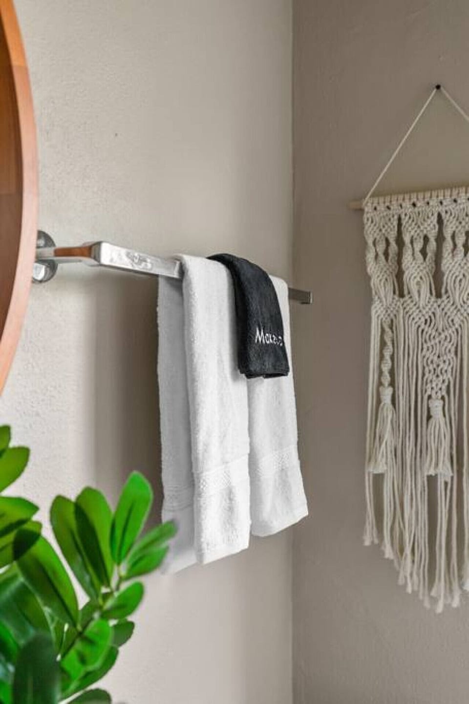 The bathroom is stocked with towels and washcloths.