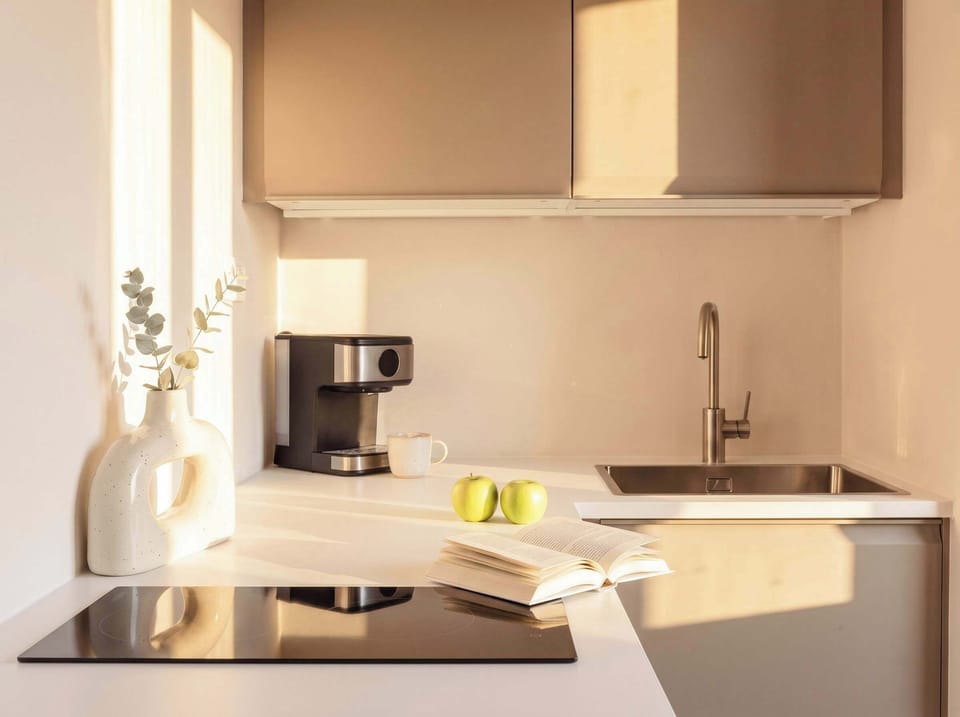 Cozy kitchen is fully equipped with everything you need for basic cooking - please, see the list of amenities