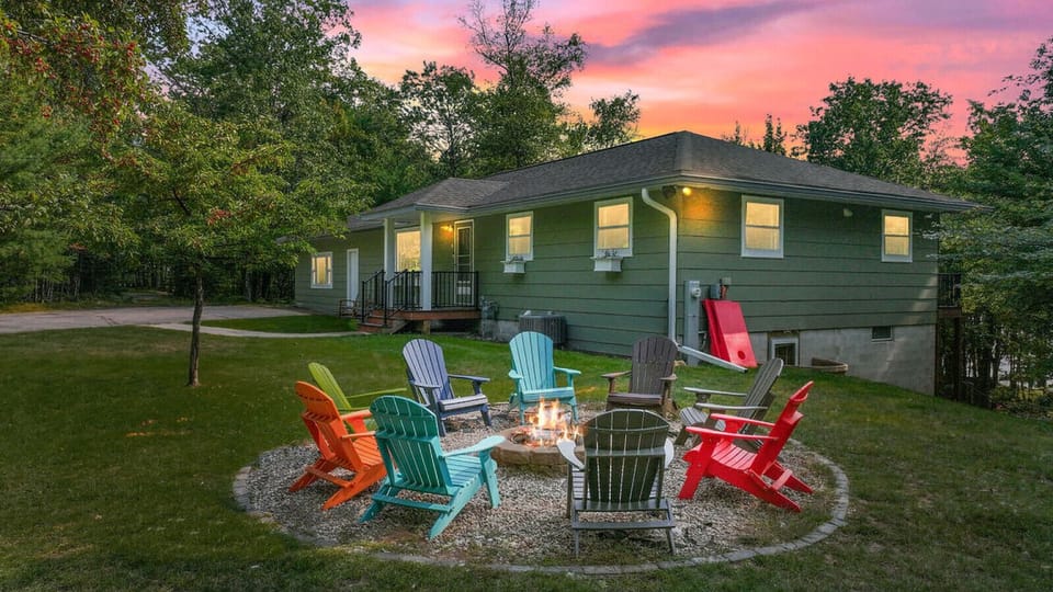 The house (lodge) and the front yard fire pit, complete with complimentary fire wood