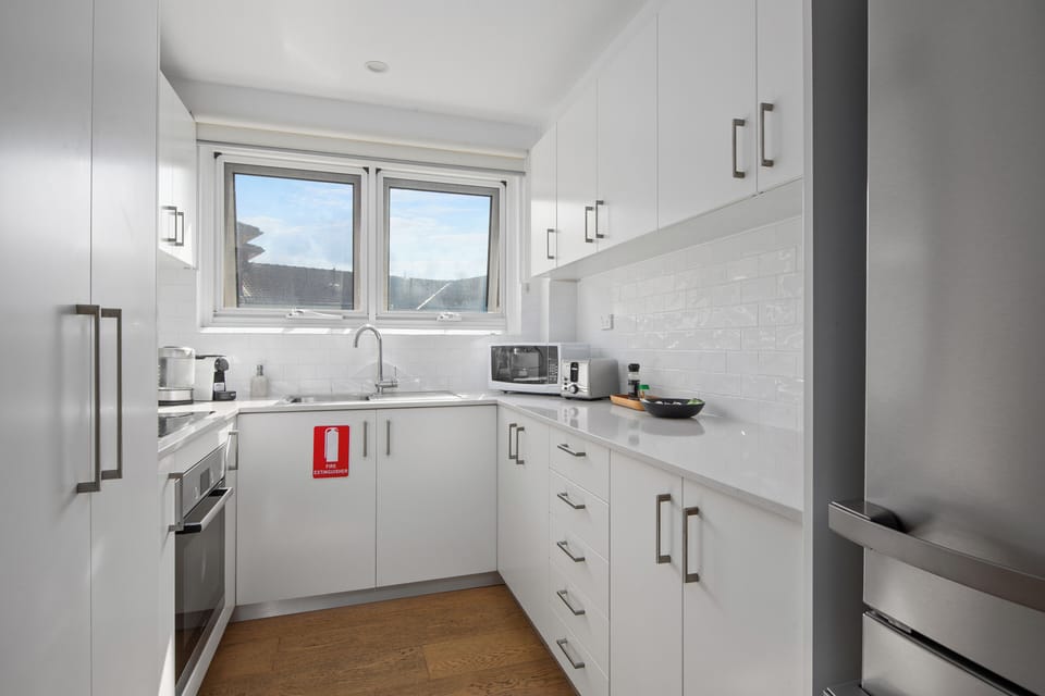 Modern kitchen with all the appliances - and a coffee machine!