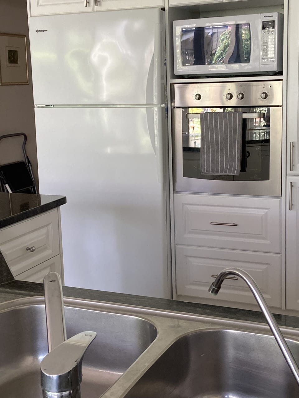 Full kitchen with family size fridge and filtered water