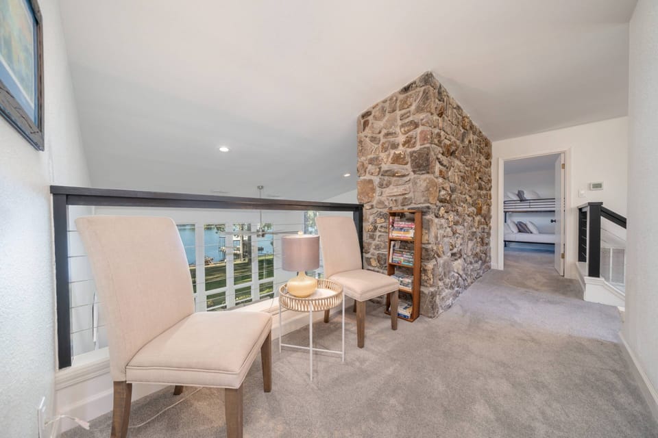 Upstairs Landing Sitting Nook I Overlooking Downstairs Living Room with Lake View