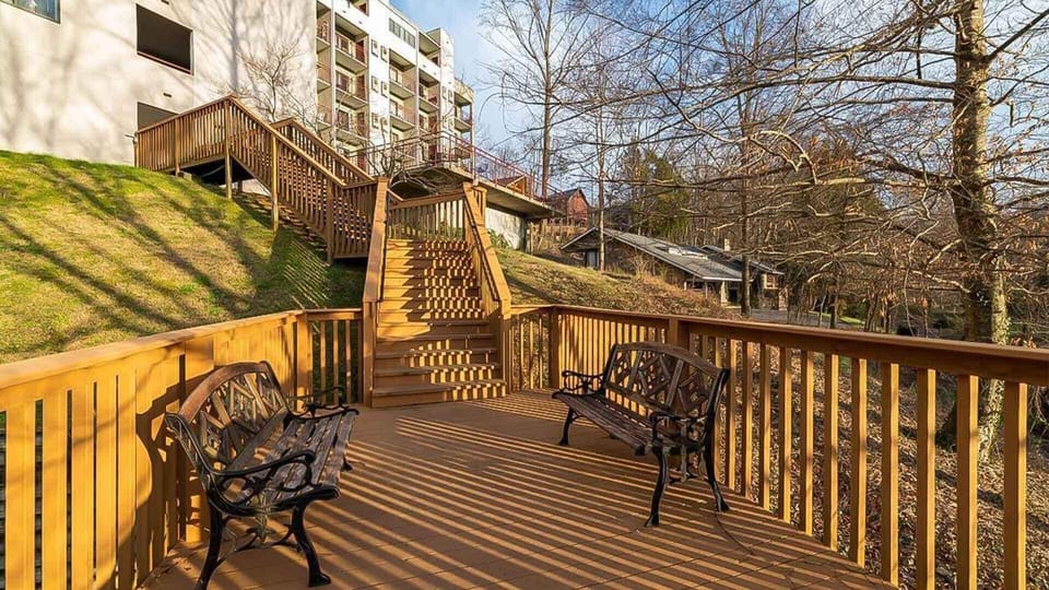 Enjoy serene moments on the spacious community deck with charming views and comfy seating!