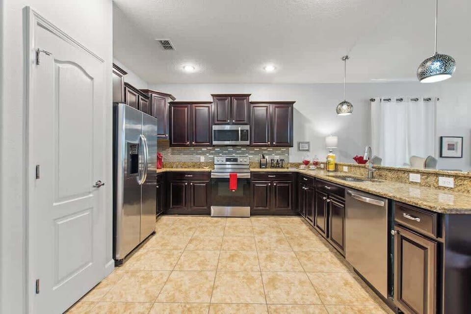 Cook your favorite meals with ease using stainless steel appliances and all the essentials provided