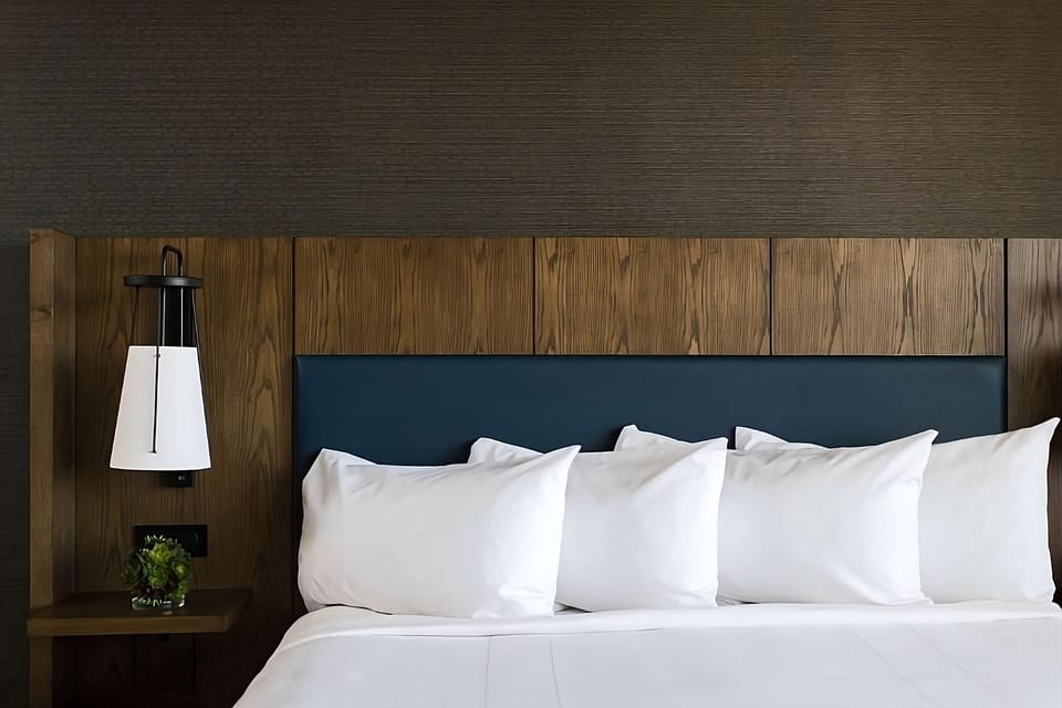 Sink into crisp linens and plush pillows for deep sleep.