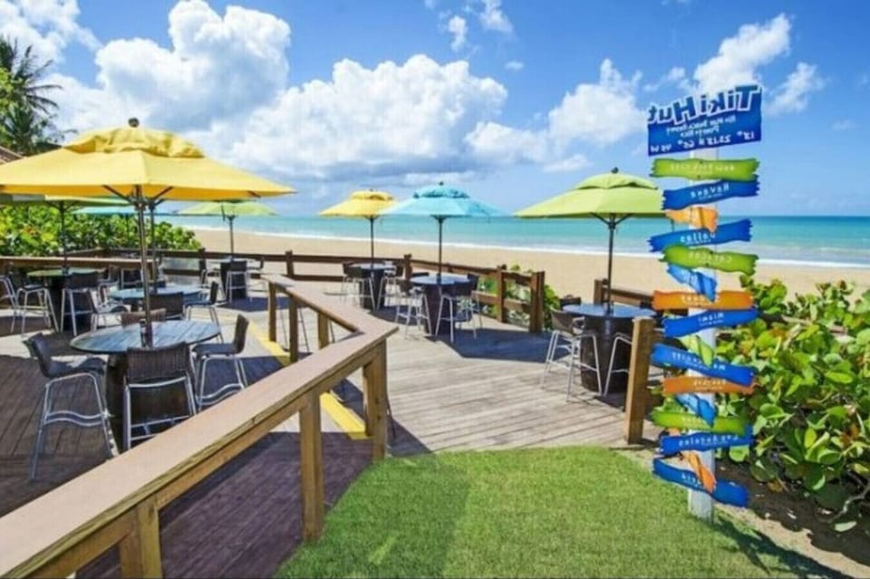 Dine with your toes almost in the sand while enjoying the beautiful ocean views