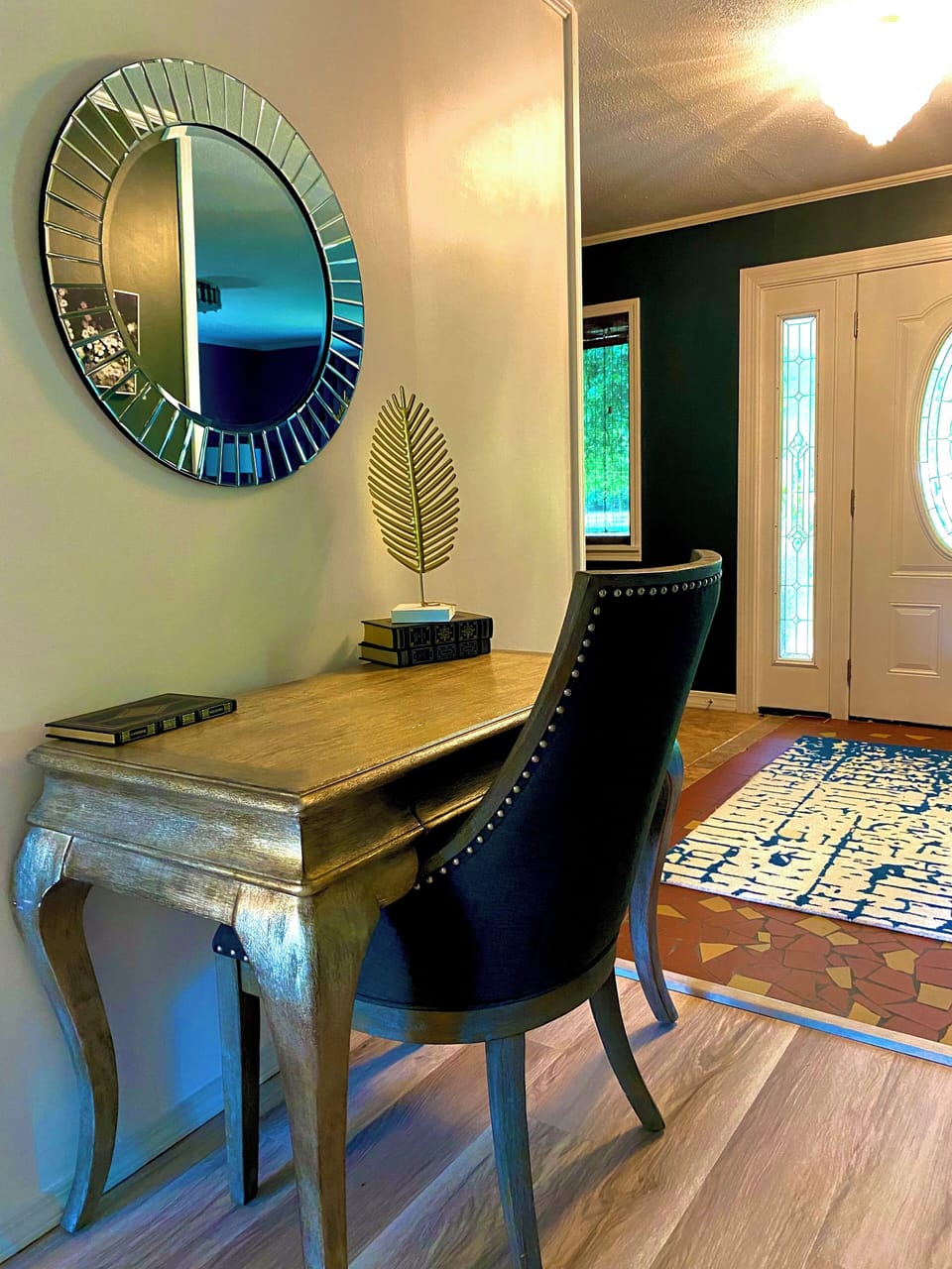 Desk area just off front entry and den area.