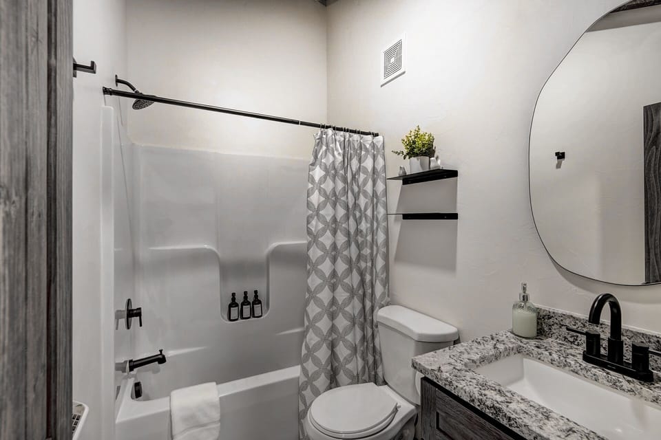 Beautiful vaulted ceilings to enhance the relaxing experience [Spare Bathroom, Upper Level]