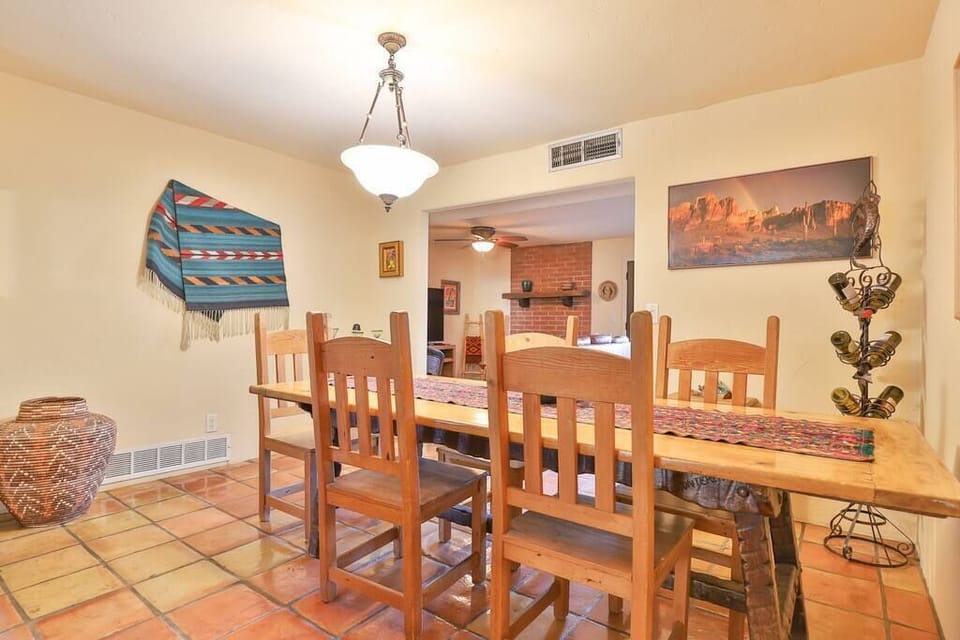 Long table has 4 extra chairs for large gatherings