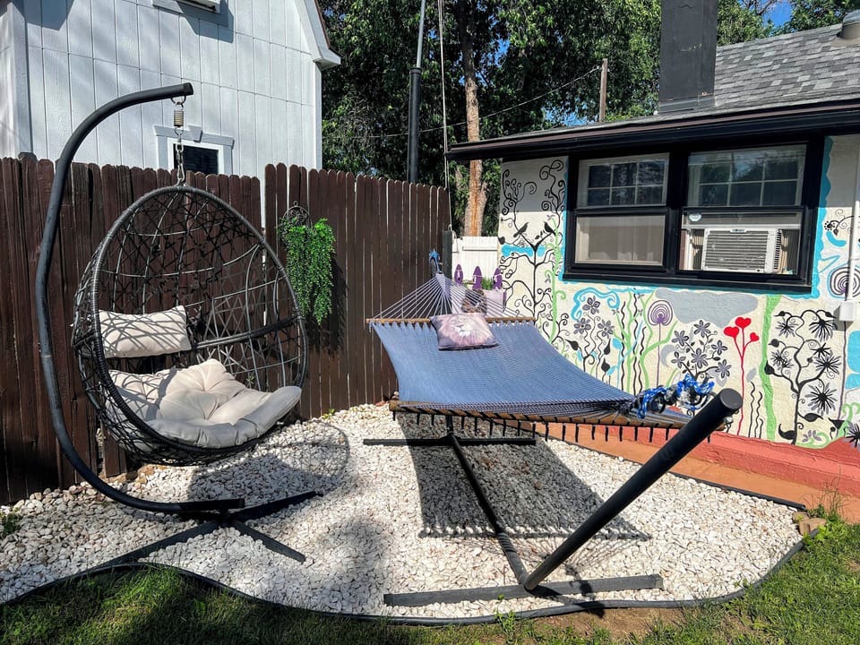 Hanging chair and hammock in the backyard.
