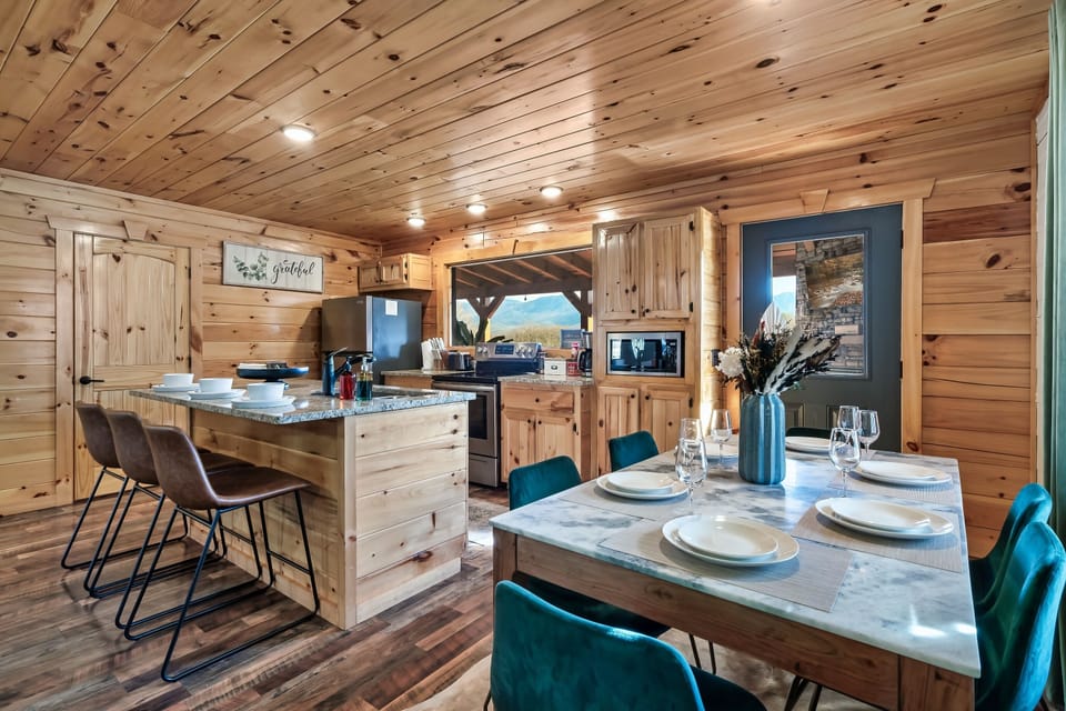 Open concept living with dining for 6 plus 3 at the bar!