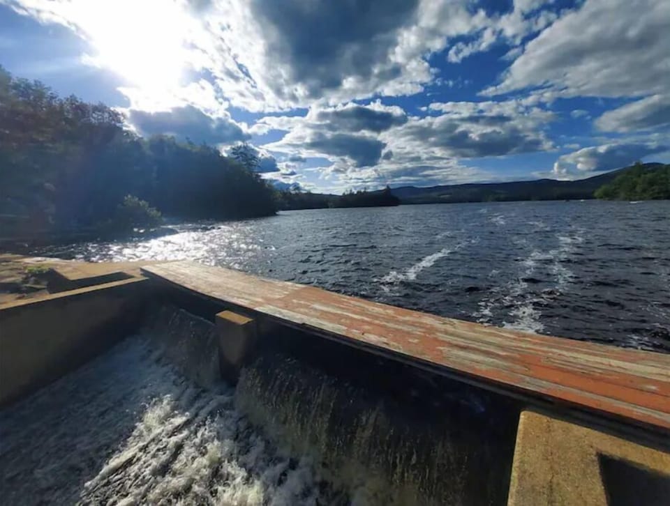 A view of Keewaydin lake where you can swim, fish relax or launch a boat.