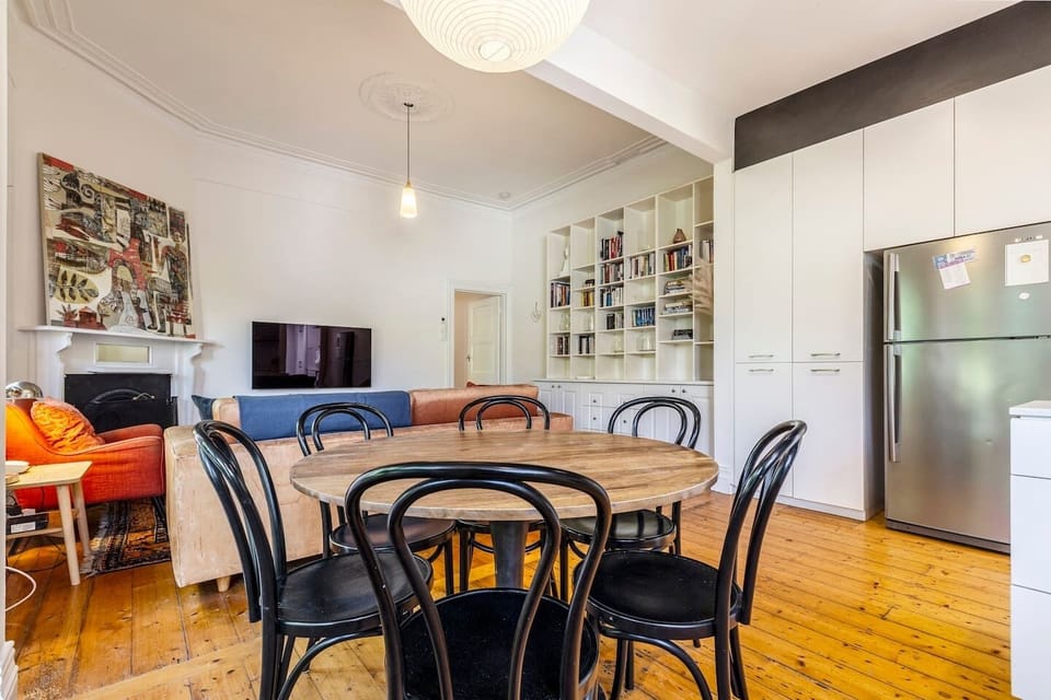 The open-plan dining space includes a six-seater table to share meals around.
