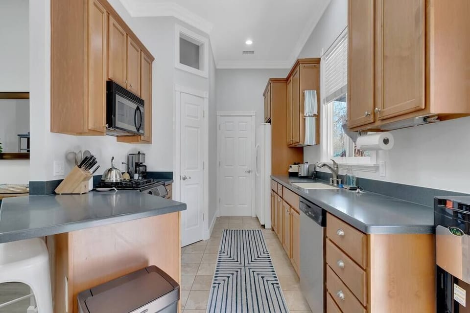 Cozy kitchen equipped with essentials for whipping up your favorite meal.