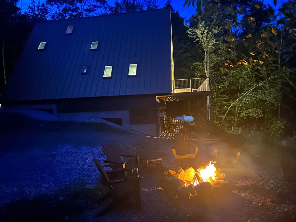 Outdoor fire pit with 4 Pollywood Adirondacks