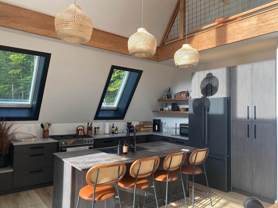 Fully stocked kitchen with breakfast nook and island