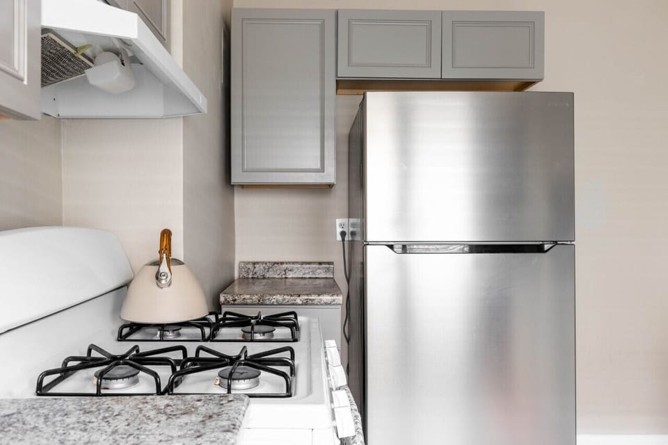 Prepare your favorite dishes in this fully equipped kitchen, furnished with all essential cooking utensils