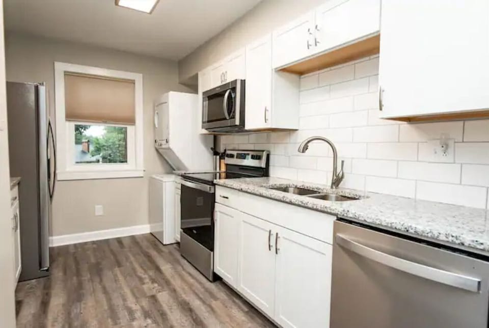 Updated galley kitchen with stainless steel appliances & in unit washer/dryer