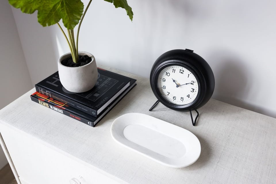 Primary Bedroom with King bed, smart TV, large walk-in closet, and en-suite bathroom.