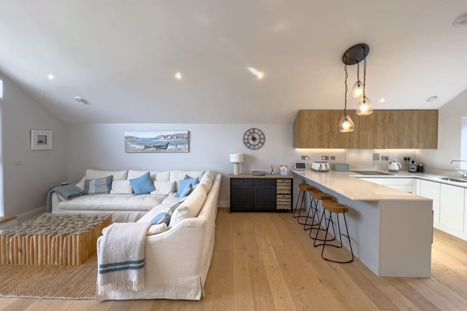 Open plan living/dining/kitchen located on the first floor.