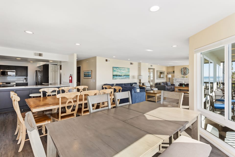 Open floor plan connects dining, living, and kitchen area