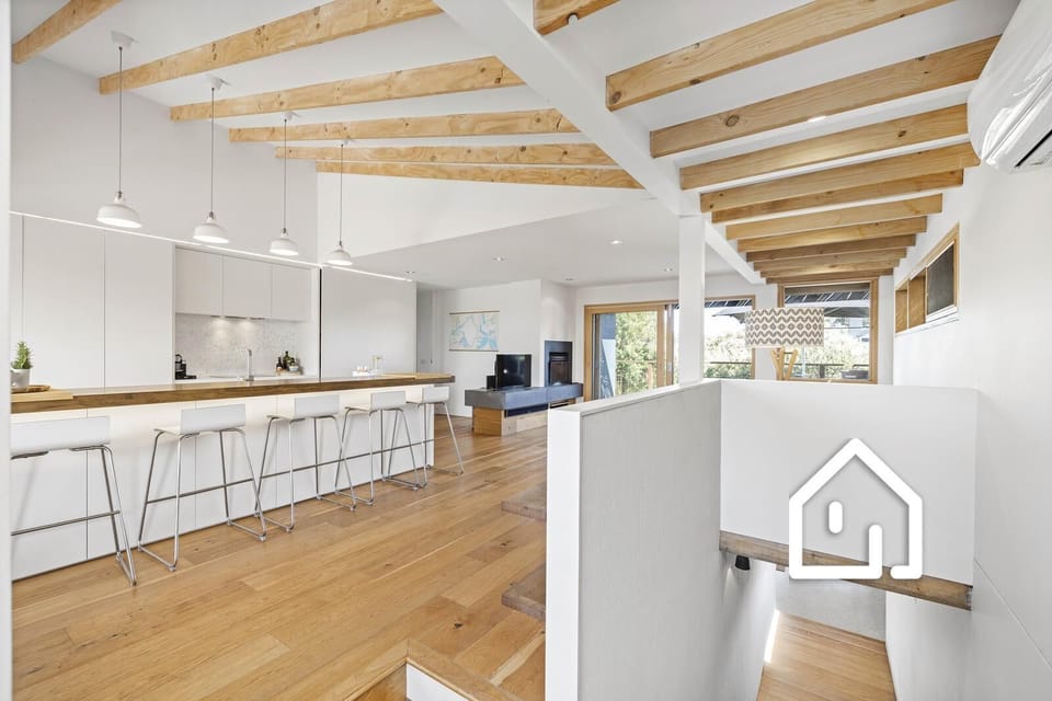 Enter the property & reach the top of the stairs to be greeted by coastal charm