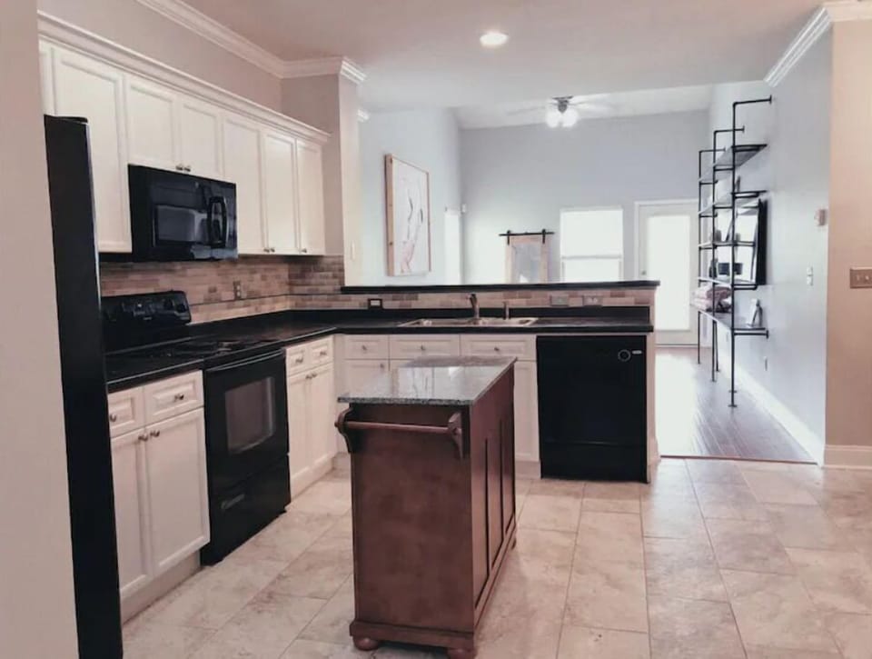 Large updated kitchen with all appliances and well equipped with Kitchen island.