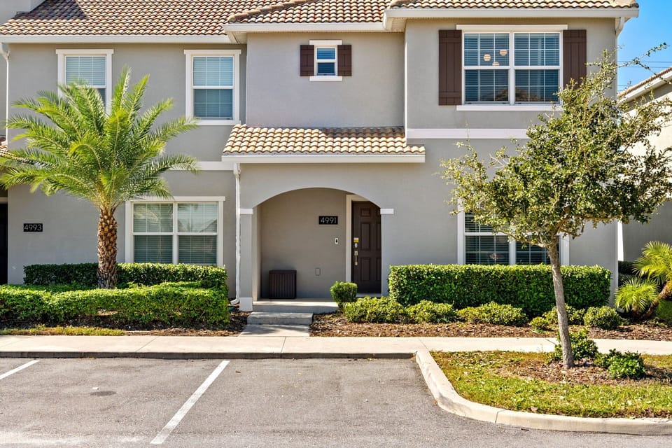 Explore the front facade of our retreat, where you'll find ample parking space
