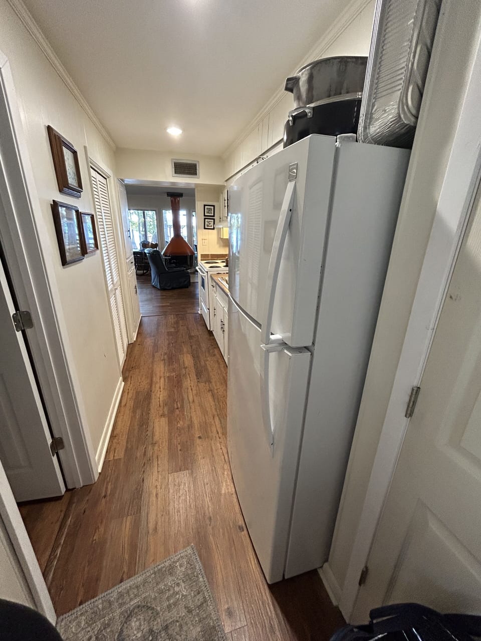Kitchen view from the small screen porch  entry door