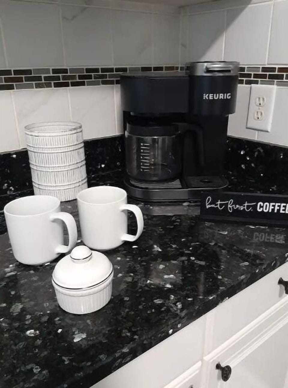 Keurig coffee station to brew a potful or single cup. Sugar, creamer & tea also.