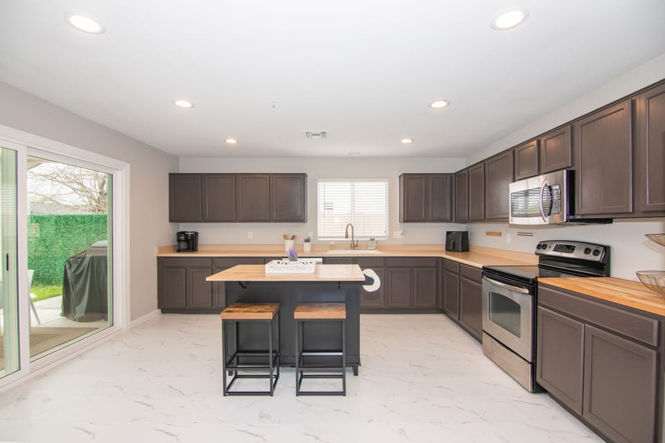 Spacious kitchen with full amenities.