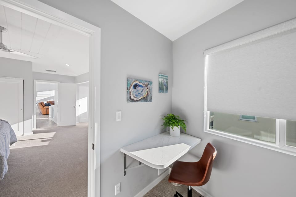 Second floor master bedroom office with built-in desk