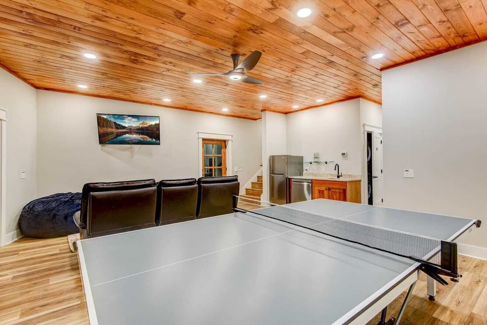 Lower Level Game Room with Theater Seats and Kitchenette