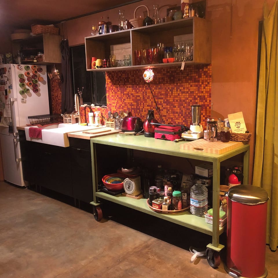 farmhouse sink, toaster, panini press, blender, drip coffee & French press.