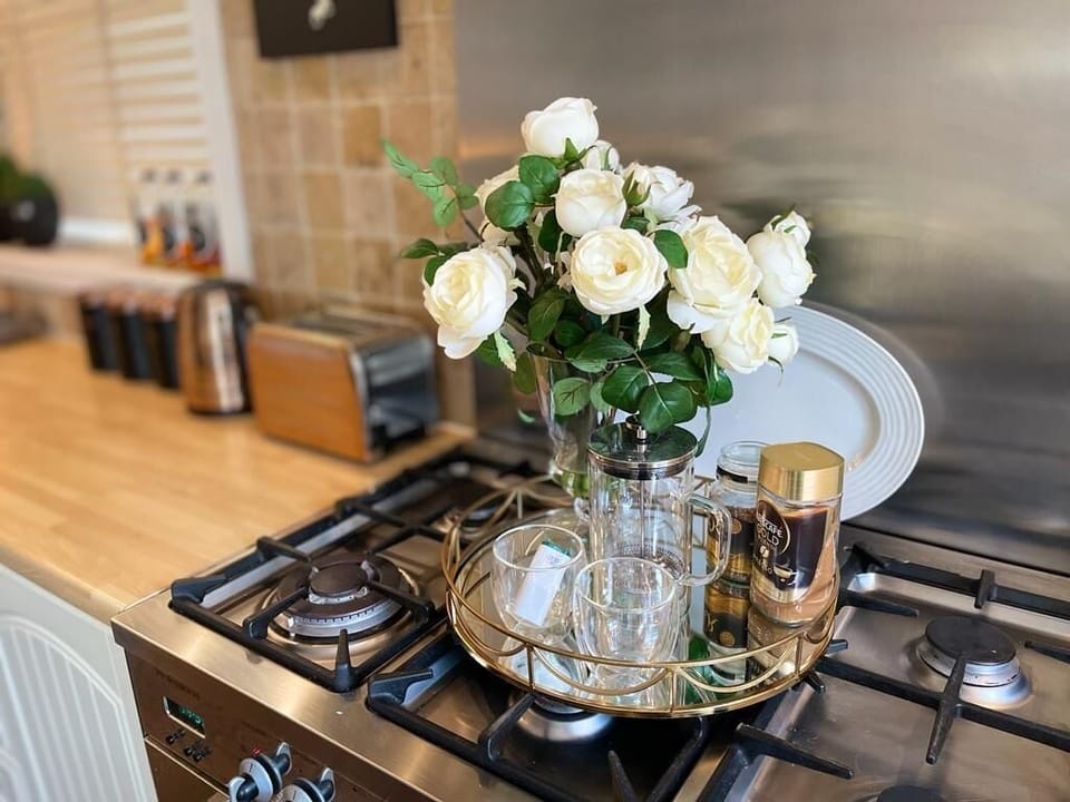 Kitchen with dining table and everything needed - all kitchen appliances, utilities etc 
6 ring gas cooker 
