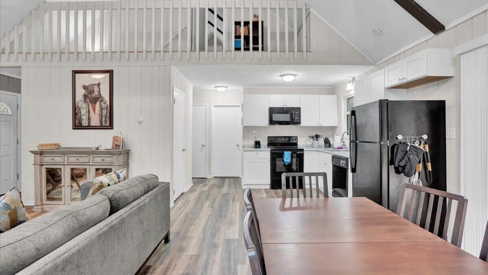 Bright Open Kitchen and Living Area with Modern Appliances